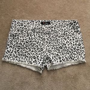 Guess white cheetah print denim shorts